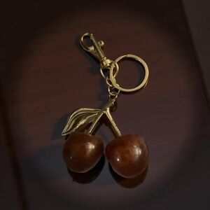 SOLD Cherries burnt orange purse keychain